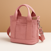 Stylish women’s canvas shoulder bag with adjustable strap, secure zipper, and multiple compartments for everyday essentials