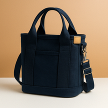 Stylish women’s canvas shoulder bag with adjustable strap, secure zipper, and multiple compartments for everyday essentials