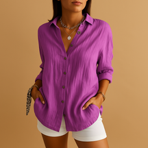 Women’s elegant pleated blouse with flattering fit, ideal for work, casual outings, or evening wear